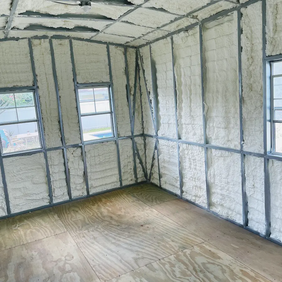 Closed-cell spray foam insulation applied to wall cavities in a residential project in Mascoutah